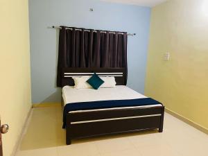 Katil atau katil-katil dalam bilik di Hotel O Sanskardhani Inn