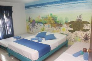 Blue Ocean Village tesisinde bir oda
