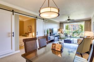 a living room with a dining table and a living room at KBM Resorts Panoramic Ocean Views Spacious 4-Bedroom Honua Kai Collection Multi Unit Listing Same Floor 2 Free Rental Cars HKH-40942 in Kaanapali Airport