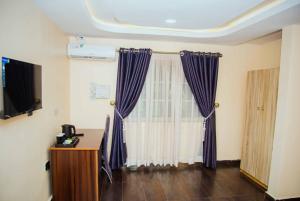 Φωτογραφία από το άλμπουμ του Ascot Tulip Hotel στο Ενούγκου