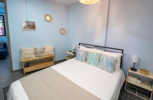 Ένα ή περισσότερα κρεβάτια σε δωμάτιο στο Casa Cielo