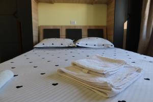 Ένα ή περισσότερα κρεβάτια σε δωμάτιο στο Varancha Apartment