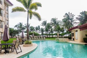 Πισίνα στο ή κοντά στο Luxury Beachfront Jaco Condo-sleep 6-1st Floor
