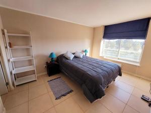 Voodi või voodid majutusasutuse Depto Laguna Vista Algarrobo toas +12 fotot