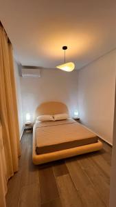 a bedroom with a large bed in a room at Sofia House sidi bou said in Sidi Bou Saïd +15 photos