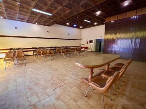 a large conference room with a table and chairs at Hotel Patios de Salta in Salta