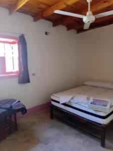 Ένα ή περισσότερα κρεβάτια σε δωμάτιο στο Mountain guest house +5 φωτογραφίες