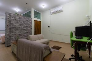 Μια τηλεόραση ή/και κέντρο ψυχαγωγίας στο Loft dos Beija Flores