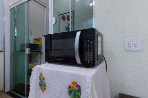 Η κουζίνα ή μικρή κουζίνα στο Loft dos Beija Flores