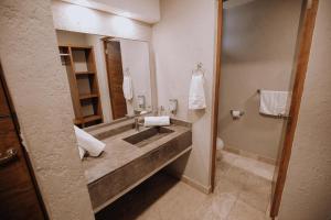 Koupelna v ubytování Casamar Jardín & Hotel