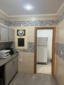 Η κουζίνα ή μικρή κουζίνα στο Relax place in heart of salmiya