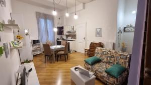 a living room with a couch and a table at Casa Piazza Santa Maria in Isernia