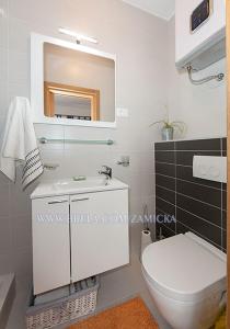 Koupelna v ubytování Apartments Zamicka + 37 fotografií