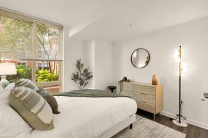 Postel nebo postele na pokoji v ubytování Hala Tysons + 18 fotografií