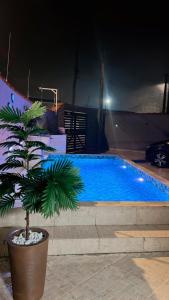 Swimmingpoolen hos eller tæt på Casa com piscina climatizada em Itanhaém!