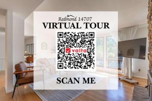 a living room with a virtual tour scan me wall art at 5BR Gem Walk to Microsoft and Near Redmond DT in Redmond