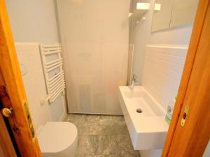 a bathroom with a toilet and a sink at Charming Mansion in Lucca in Lucca +24 photos