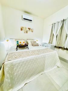 Postel nebo postele na pokoji v ubytování casa luxo, ate 10 pessoas