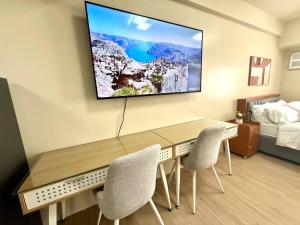 Μια τηλεόραση ή/και κέντρο ψυχαγωγίας στο Avida Dos in Iloilo City Ayala Property Rentals by Madz