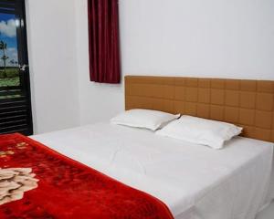 Postel nebo postele na pokoji v ubytování Eliezer Holiday Home By Teal Luxury Stays - Munnar