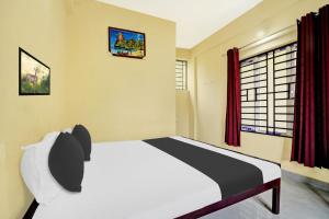 Imagen de la galería de Hotel 83052 O Souparnika Residency, en Pathanāmthitta