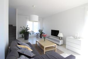 Telewizja i/lub zestaw kina domowego w obiekcie Equilibrium Apartments