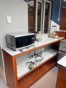 Dapur atau dapur kecil di Cozy Mini-Apartment-Cusco