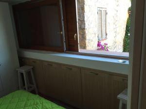 Letto o letti in una camera di Residence Scala Chiusa
