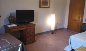 TV a/nebo společenská místnost v ubytování Latera
