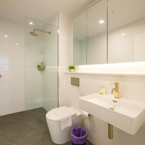 Bilik mandi di SkyPark Oasis Retreat 2Br@ close to Olympicpark