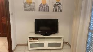 TV a/nebo společenská místnost v ubytování Monte Faro El corazón de Galicia