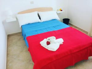 A bed or beds in a room at Gaietta