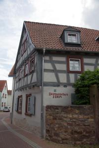 a building with a sign on the side of it at Doernersches Haus in Walldorf