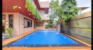 Πισίνα στο ή κοντά στο Malhar Mist Villa