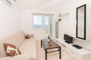 TV a/nebo společenská místnost v ubytování Apartmani Vesna
