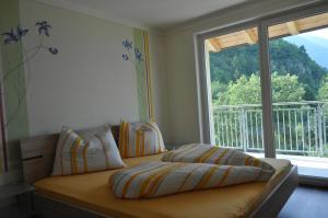 Кровать или кровати в номере Ferienwohnungen Niederhof
