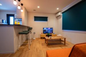 TV/trung tâm giải trí tại Kanawa Apartment - Vacation STAY 49655v