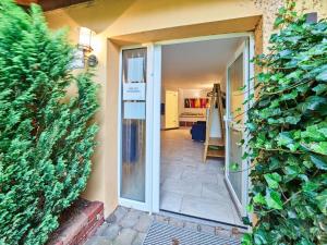 a door leading into a hallway with a house at Gemütliche Wohnung in Hellenthal in Hellenthal