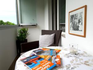 a table with some books on top of it at Atelier Aleksandry in Gdynia