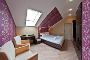 Postel nebo postele na pokoji v ubytování Hotel Svetlitsa