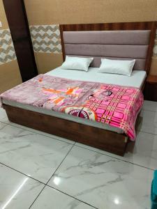 Postel nebo postele na pokoji v ubytování Shumba home stay