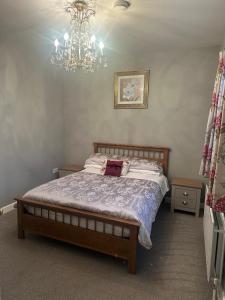 Voodi või voodid majutusasutuse Country Cosy Cottage toas