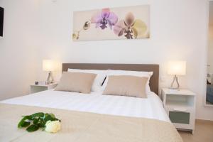 Postel nebo postele na pokoji v ubytování Summer Lounge Apartments