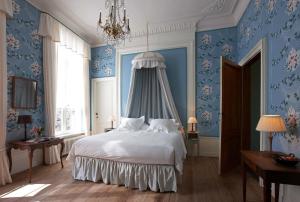 Postel nebo postele na pokoji v ubytování B&B De Corenbloem Luxury Guesthouse - Adults Only