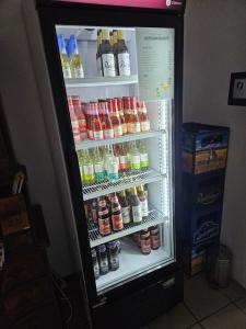 an open refrigerator filled with lots of drinks at Olymp 1-4 in Bamberg