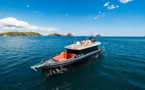 a small boat in the middle of the water at Katamaran Hotel & Resort Komodo in Labuan Bajo