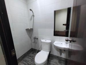 Koupelna v ubytování Jajapin Hotel putri Sari