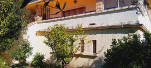 a building with a cross on the side of it at Sweet villa view 26 in Nyons