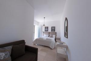 A bed or beds in a room at B&B Villa Cinzia