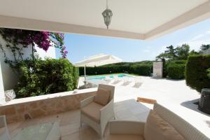 A balcony or terrace at B&B Villa Cinzia